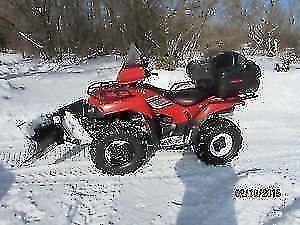 ATV with trailer and plow