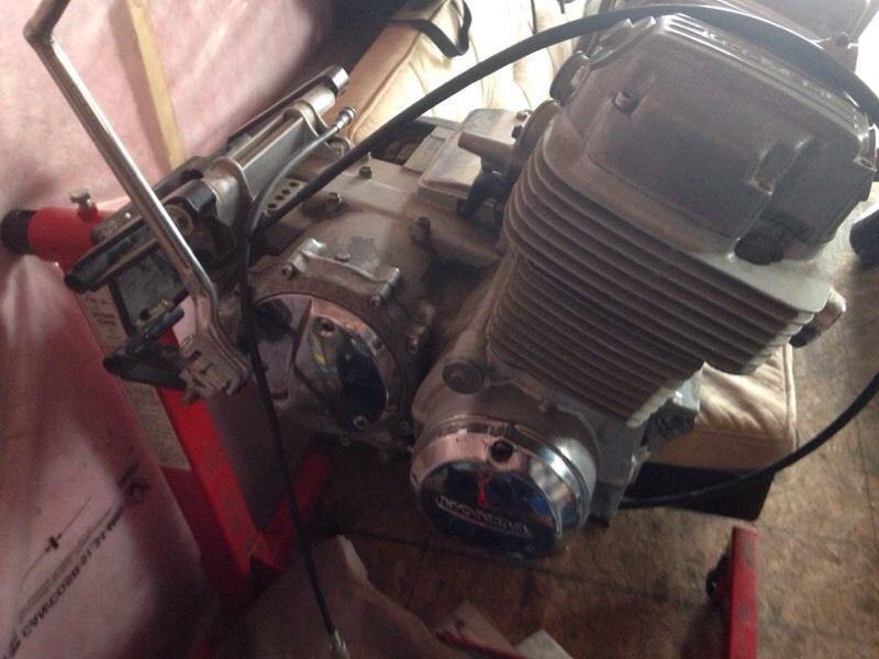 79 Honda 750 motor W/ stand and box full of parts