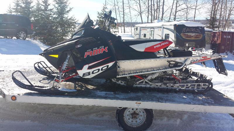 2 almost new sleds and trailer and sled deck 12500 for all
