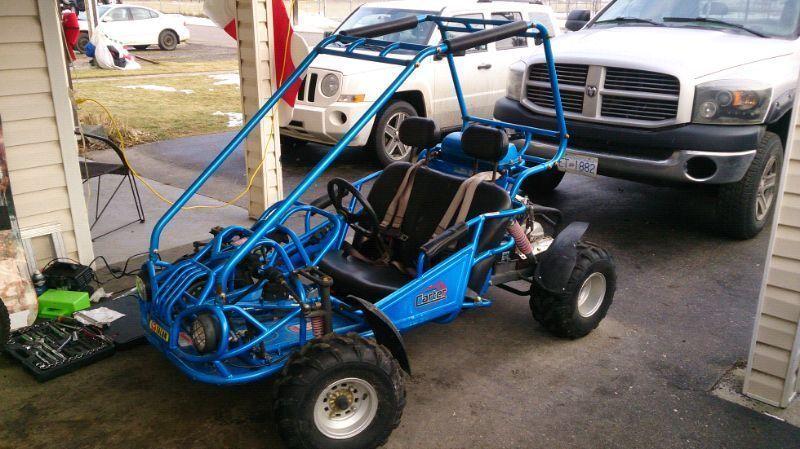 2 sleds, dune buggy for trade