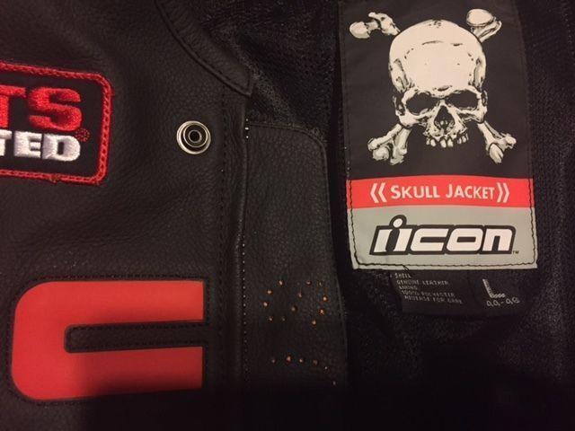 Icon black and red armor padded skull jacket