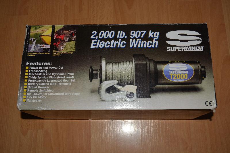 New, still in the box and plastic, 200 lb(907 kg) Electric Winch