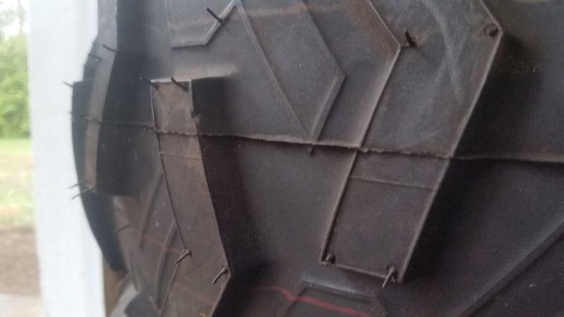 4 BRAND NEW NEVER DRIVING ON YAMAHA GRIZZLY TIRES AND RIMS