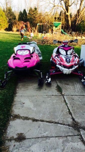 His & Hers snowmobile
