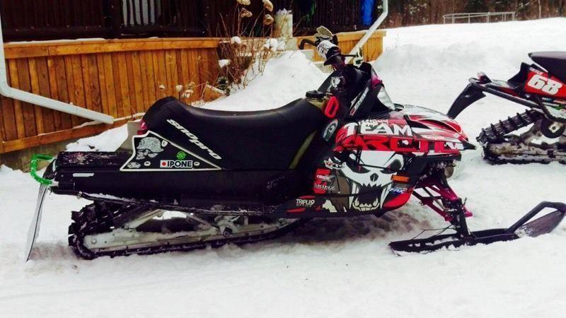 His & Hers snowmobile