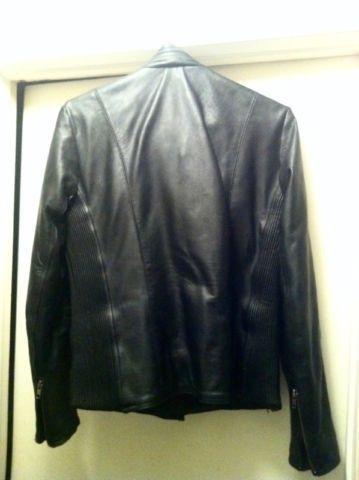 Screaming Eagle Leather motorcycle jacket. Coat is a Woman's Med