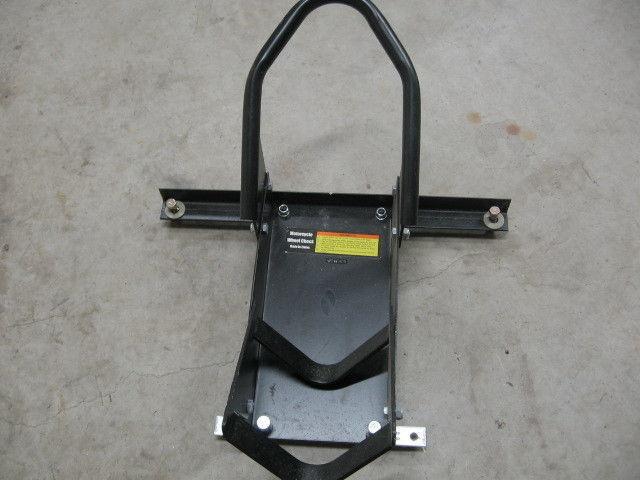 ADJUSTABLE WHEEL CHOCK FOR TRANSPORTING MOTORCYCLES