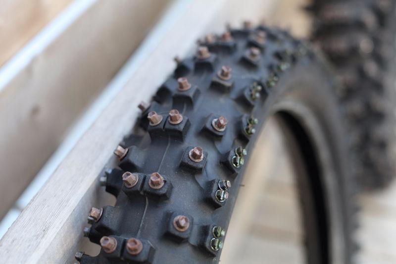 Dirt bike tires with Ice studs Screws