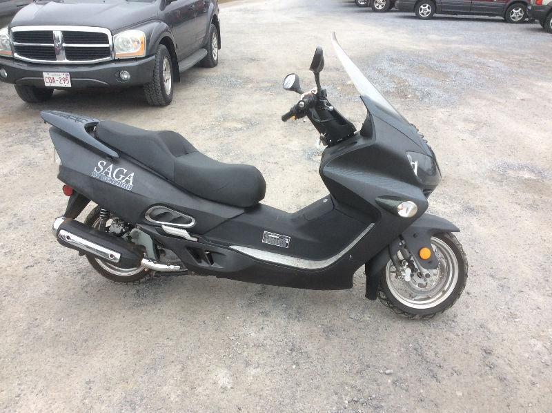 Scooter 250cc saga built for around town or highway speeds $2500