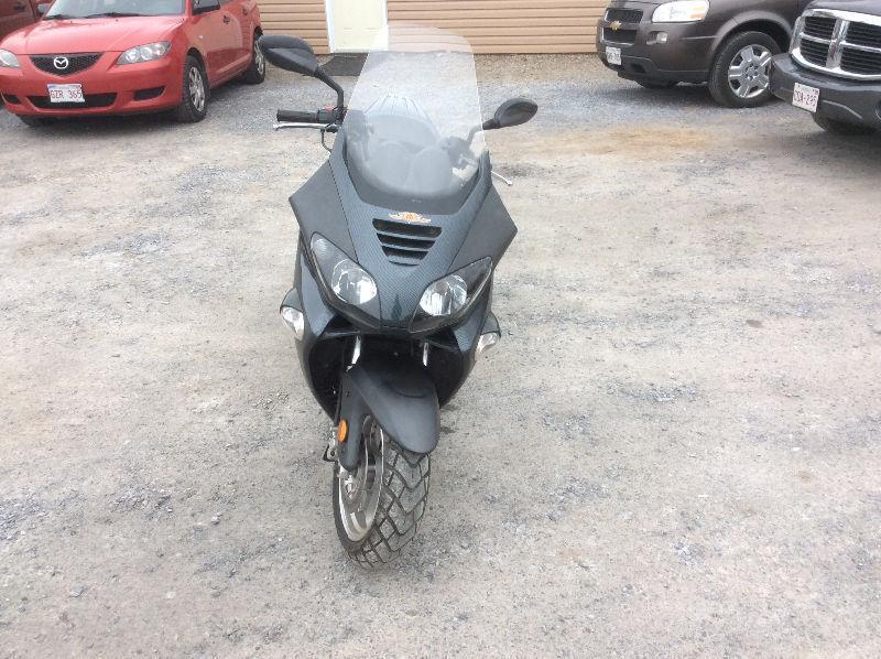 Scooter 250cc saga built for around town or highway speeds $2500