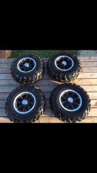 4 lightly used Atv wheels and tires