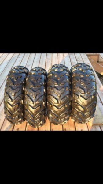 4 lightly used Atv wheels and tires