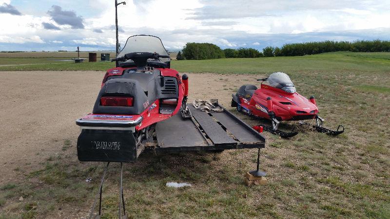 3 sleds and trailer