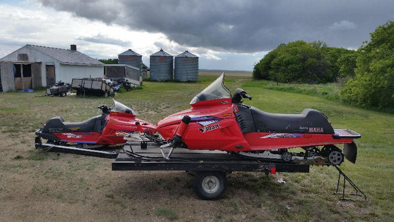 3 sleds and trailer