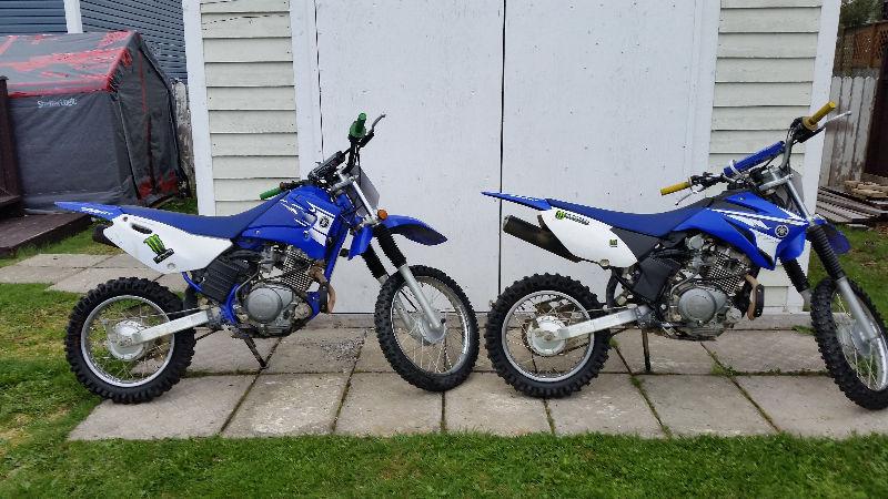 2 dirt bikes