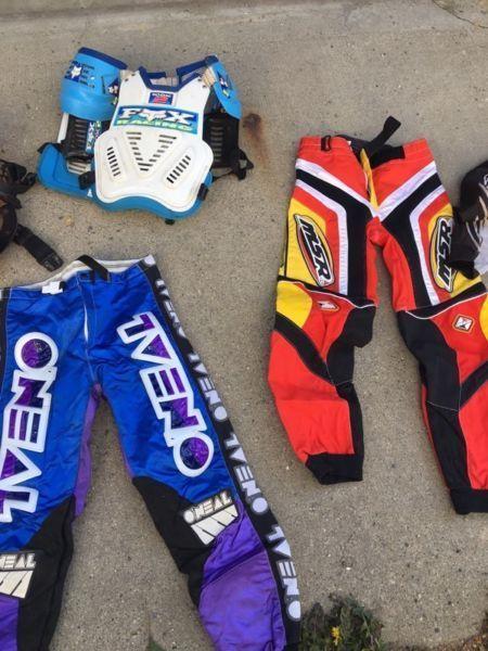 Motocross gear, pants (32), boots (11), helmets (M), & more