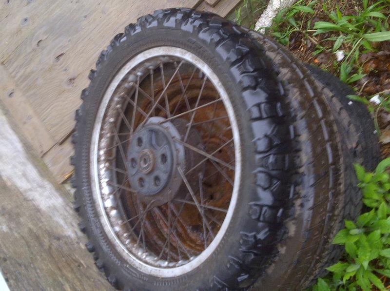 one dirtbike tire on rim tubes good doesnt leak at all