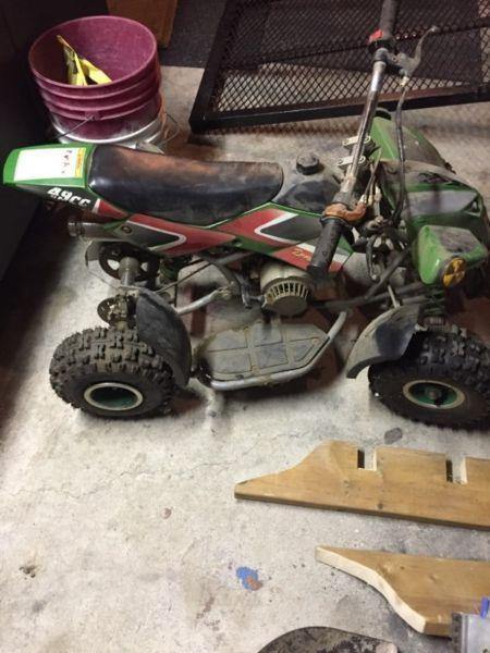 Selling 49cc atv doesn't run everything on it is mint
