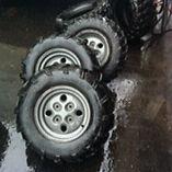 4 artic cat rims and 6 mud tires