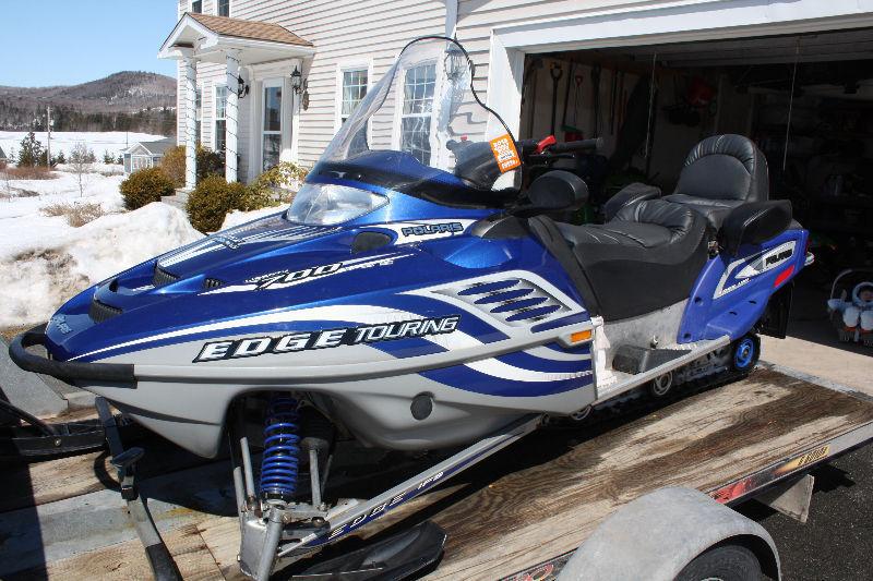 Polaris 700cc Two-up Edge, Classic, and trailer. (Package $4200)