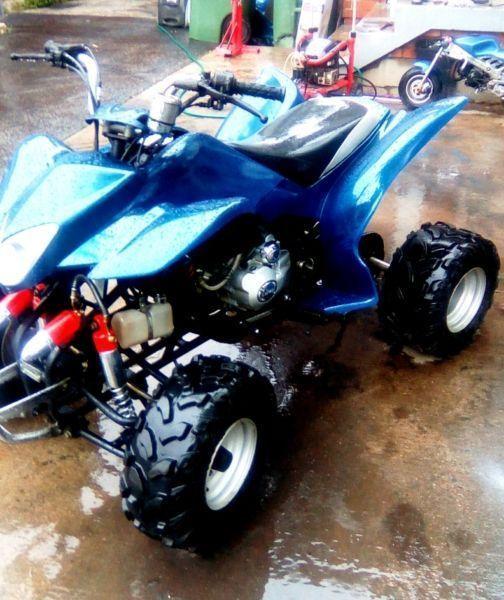 atv fast liqued cooled gas shocks and fresh paint