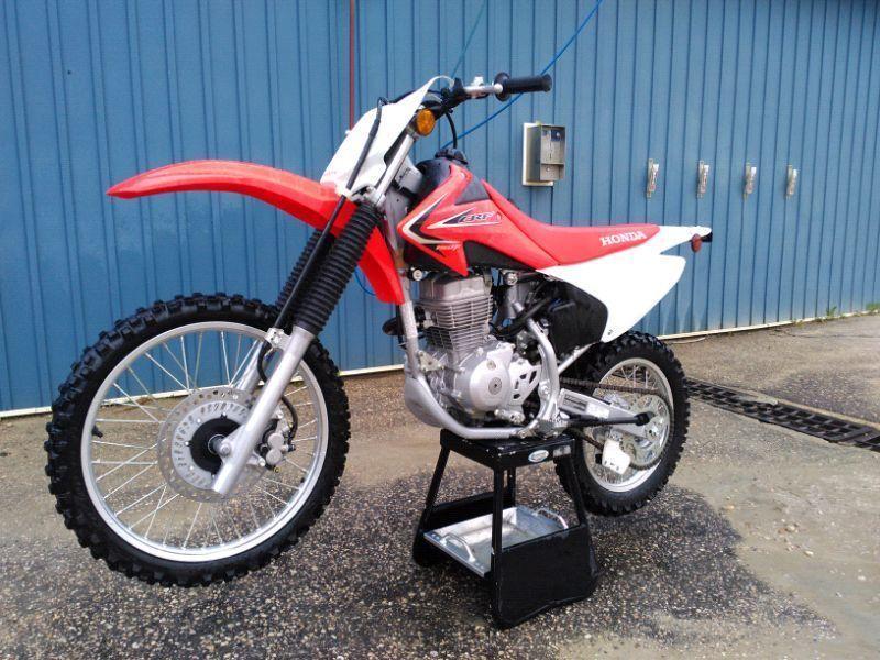 2012 CRF 150 F Brand New. Trade for KTM of KX 85