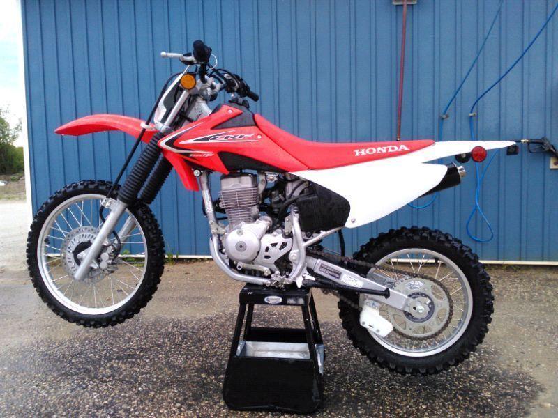2012 CRF 150 F Brand New. Trade for KTM of KX 85