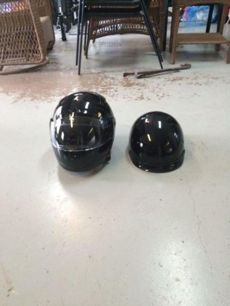 2 motorcycle helmets