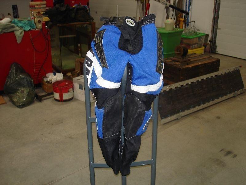 pair of size 26 motocross-dirt bike pants