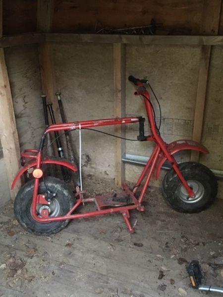 Old frame to a bike and a set of four wheeler ramps