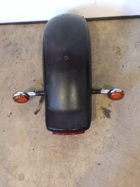 Rear fender and light acessories and axle license plate bracket