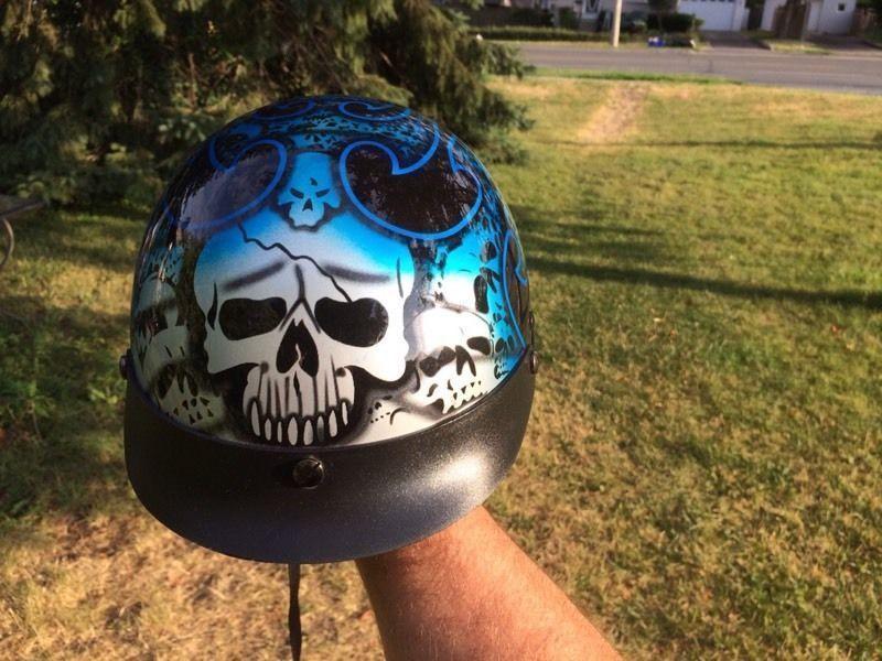 Motorcycle helmet skull theme with blue flames