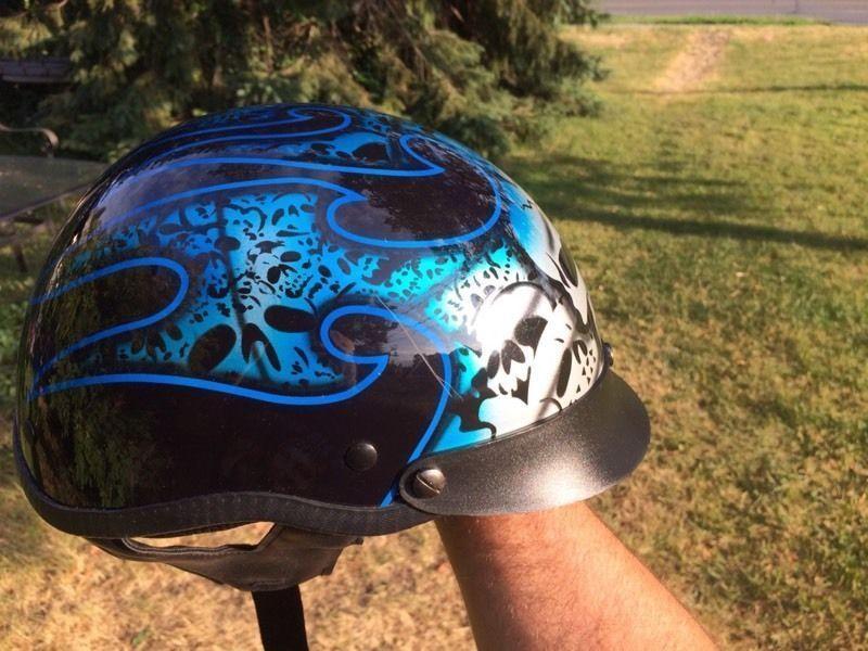 Motorcycle helmet skull theme with blue flames