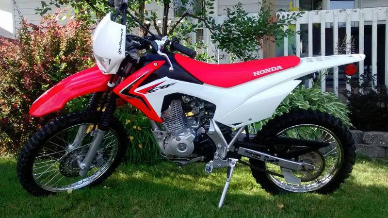 CRF 125 (2014) à l'état neuf!