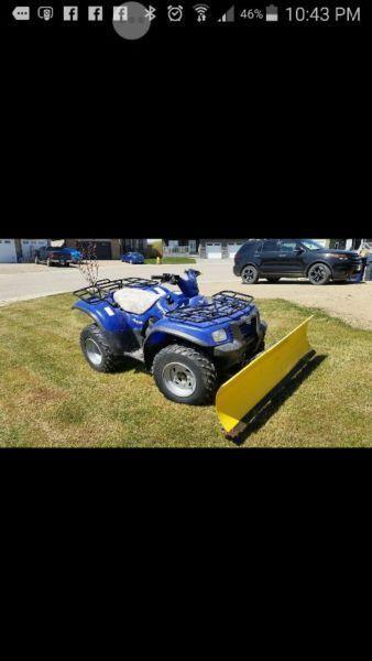 Low km ATV and 1979 Johnson outboard boat motor