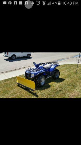 Low km ATV and 1979 Johnson outboard boat motor