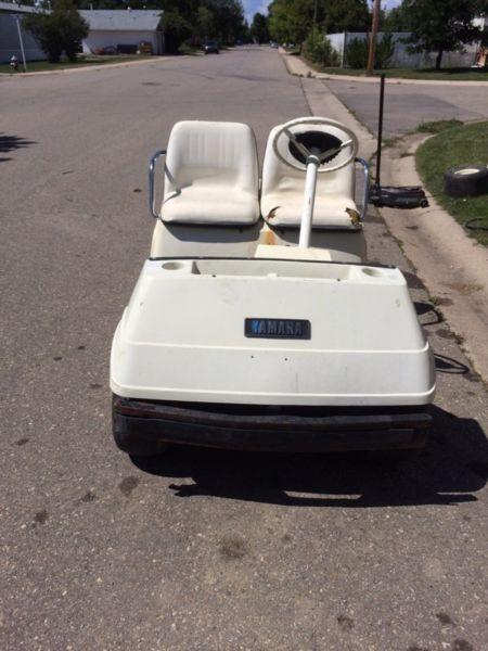 Two golf carts for sale 800 for both