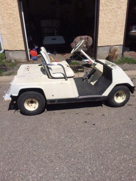 Two golf carts for sale 800 for both