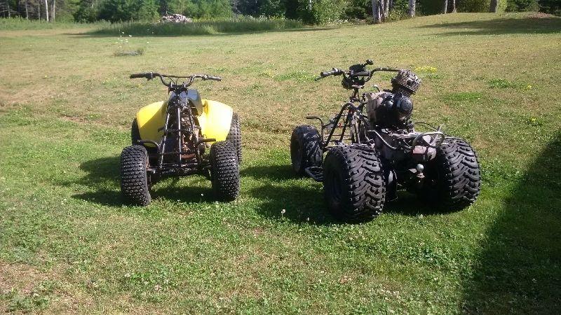 2 Suzuki 125 atv's