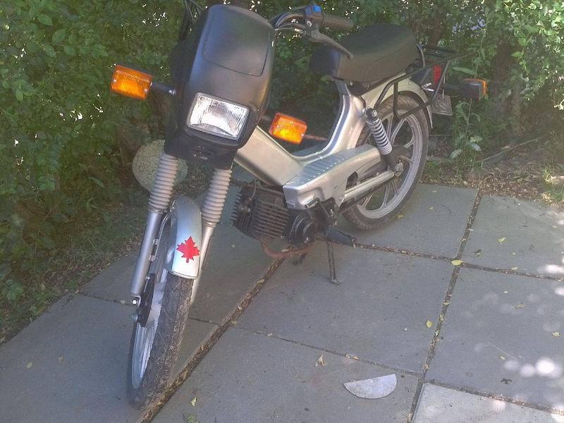 Matching set of TOMOS scooters