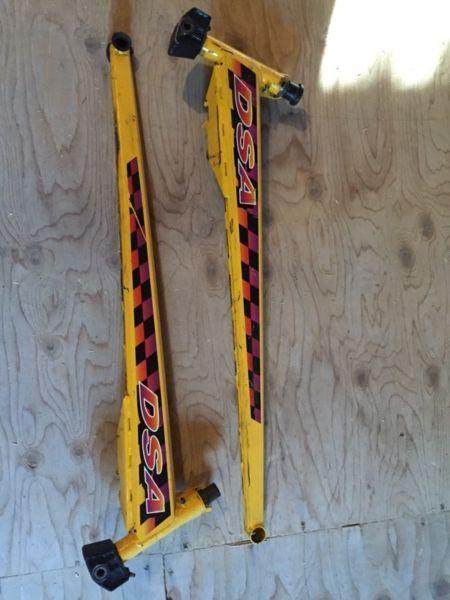 Snowmobile trailing arms