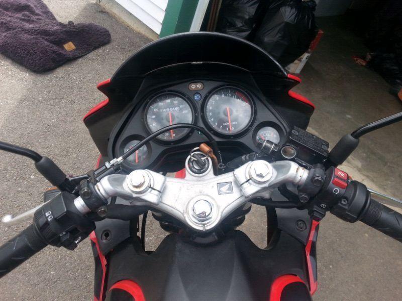 2008 Honda cbr 125r with 2 jacket and gloves