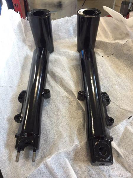 Harley touring black fork legs and cowbells