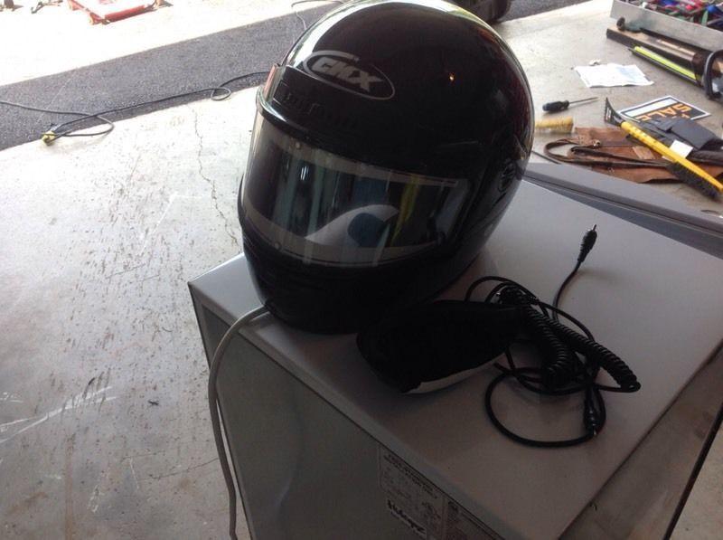 Full face helmet with heated shield