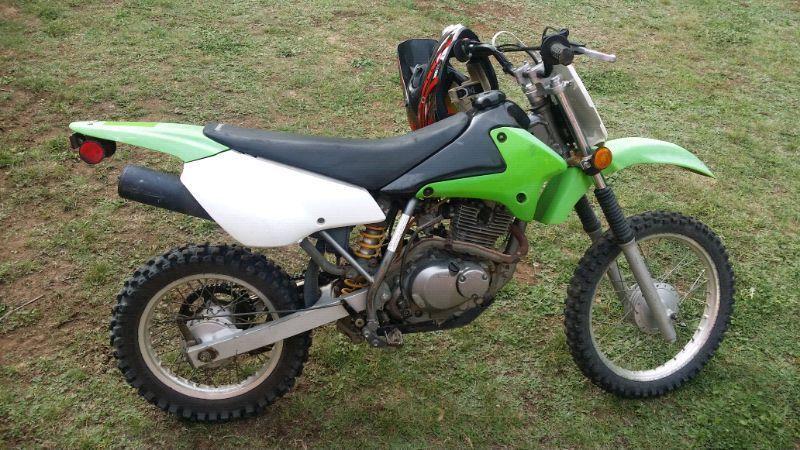 04 kawasaki 125 dirt bike trade for ATV or 1550$OBO