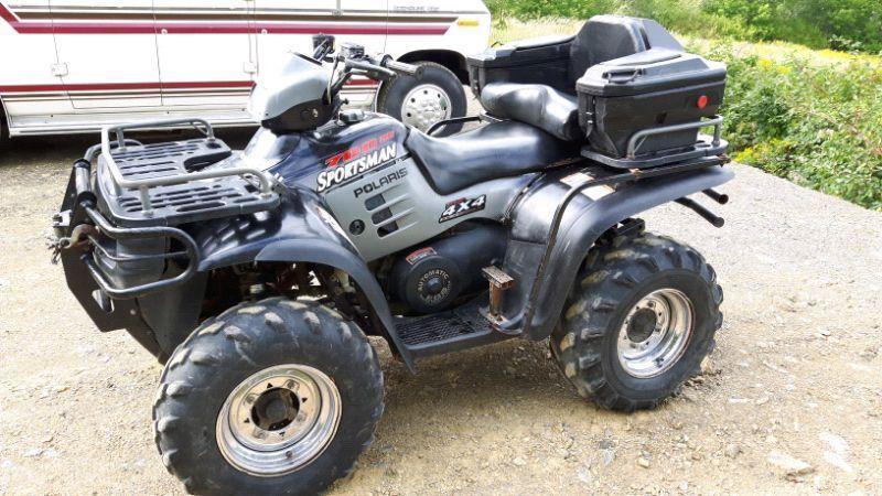 02 Polaris Sportsman 700 with plow