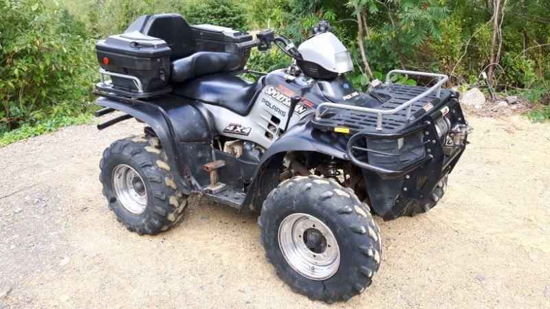 02 Polaris Sportsman 700 with plow